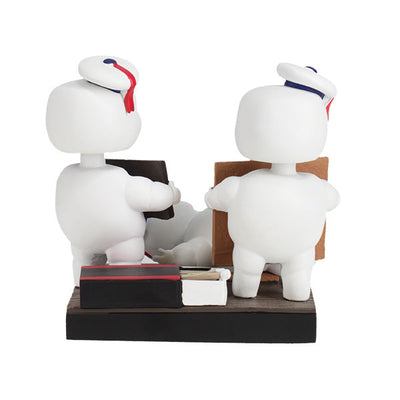 Ghostbusters Afterlife Mini-Pufts S'mores Bobblehead, featuring three adorable Mini-Pufts in dynamic poses holding s'mores, standing 4 inches tall.