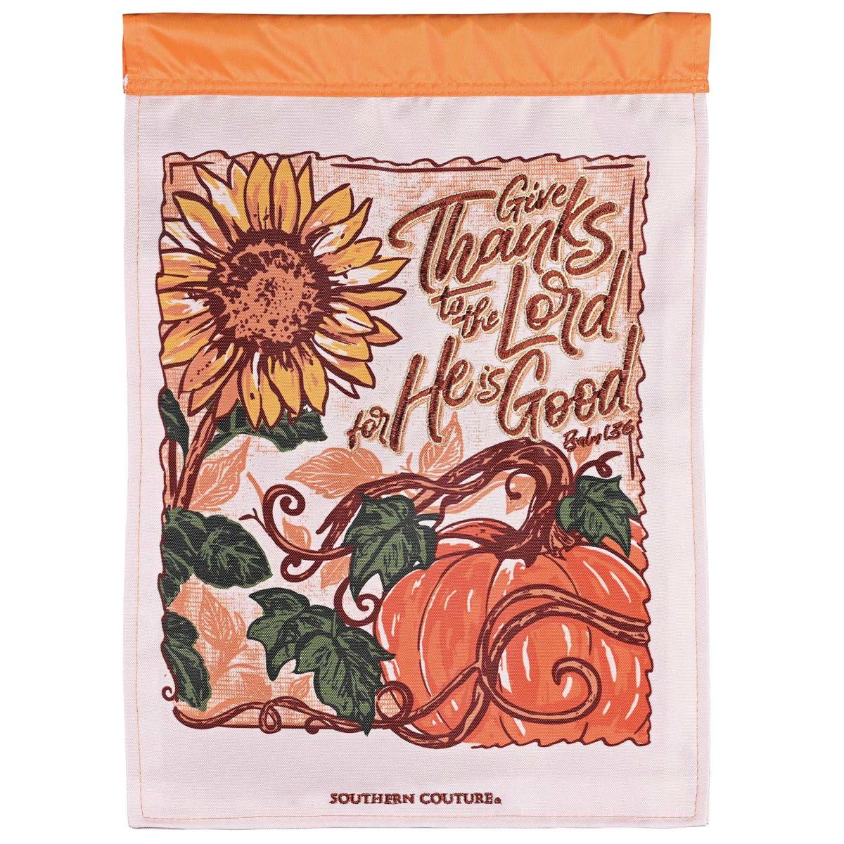 Give Thanks To The Lord double-sided garden flag featuring intricate embroidery and fabric appliques, displayed in a beautiful outdoor setting.
