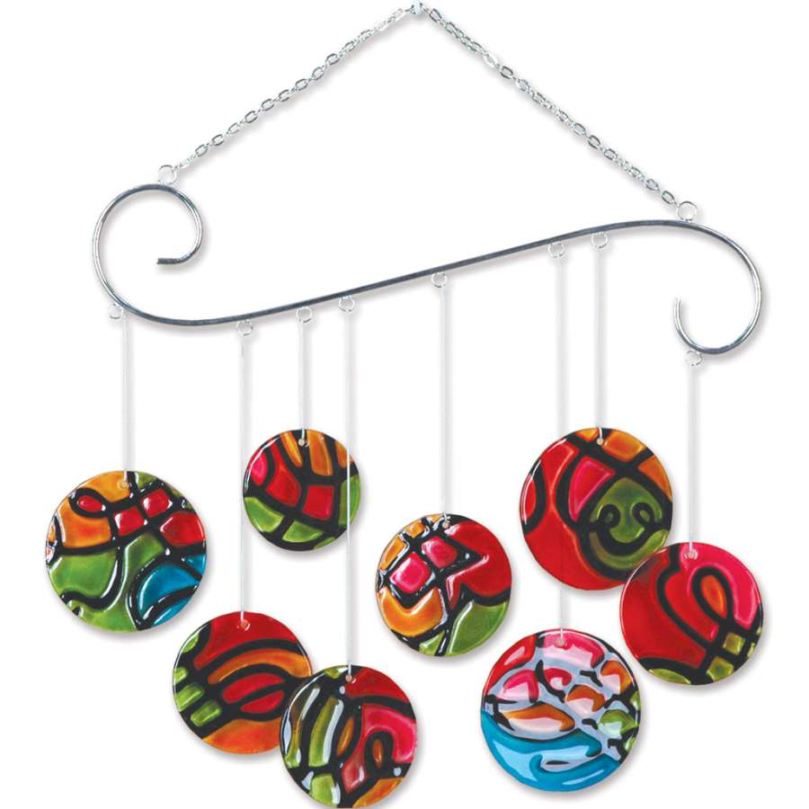 Colorful Glass Scroll Mobile hanging in outdoor setting, showcasing circular designs that catch light beautifully.