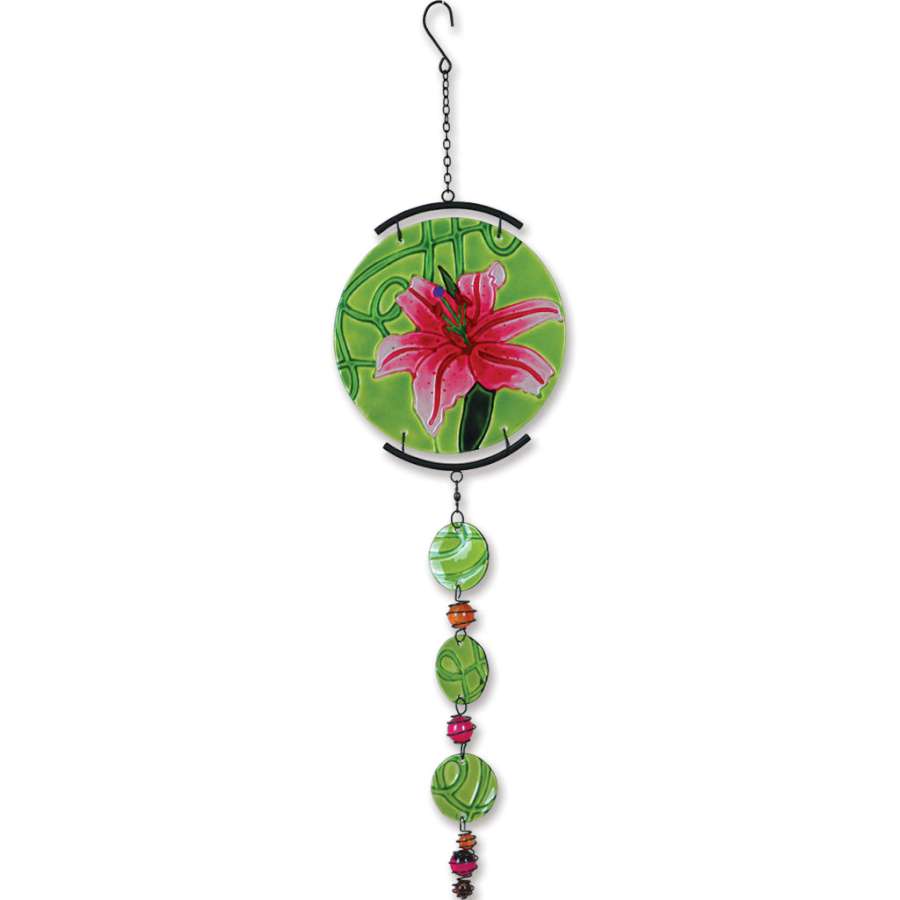 A colorful Glass Sun Disk Mobile - Stargazer hanging outdoors, featuring intricate floral designs and a mix of glass and metal elements.