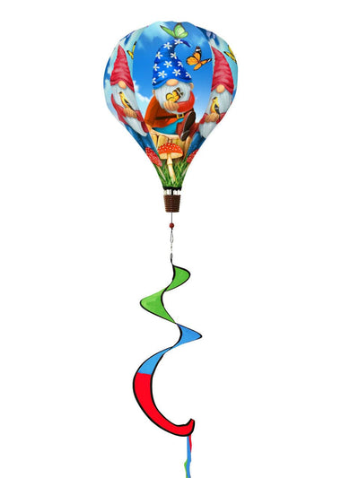 Hot air balloon spinner with garden gnome, vibrant florals, and weather-resistant polyester for fun, breezy outdoor seasonal or year-round decoration.