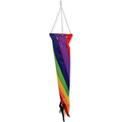 Gyro Delta Kite - Rainbow Checks showcased in a clear blue sky, with its vibrant checkered pattern creating a stunning visual effect.