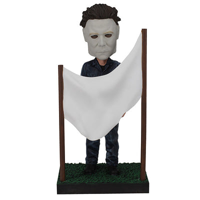 Halloween - Michael Myers in a Clothesline Bobblehead showcasing the iconic horror character mid-action, crafted with premium details on a decorative shelf.