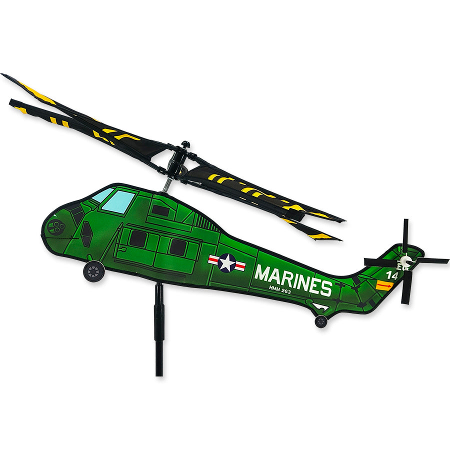 Helicopter Spinner - UH-34 Marine lawn ornament in vibrant colors spinning gracefully in a garden setting.
