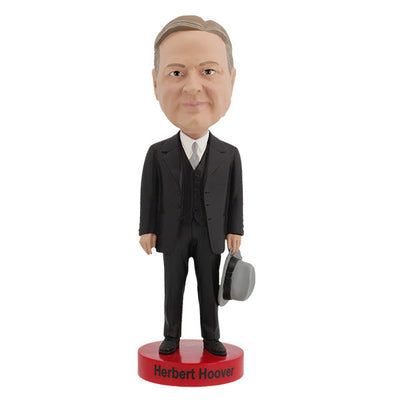 Herbert Hoover Bobblehead showcasing intricate hand-painted details in a colorful collector's box, measuring approximately 8 inches tall.
