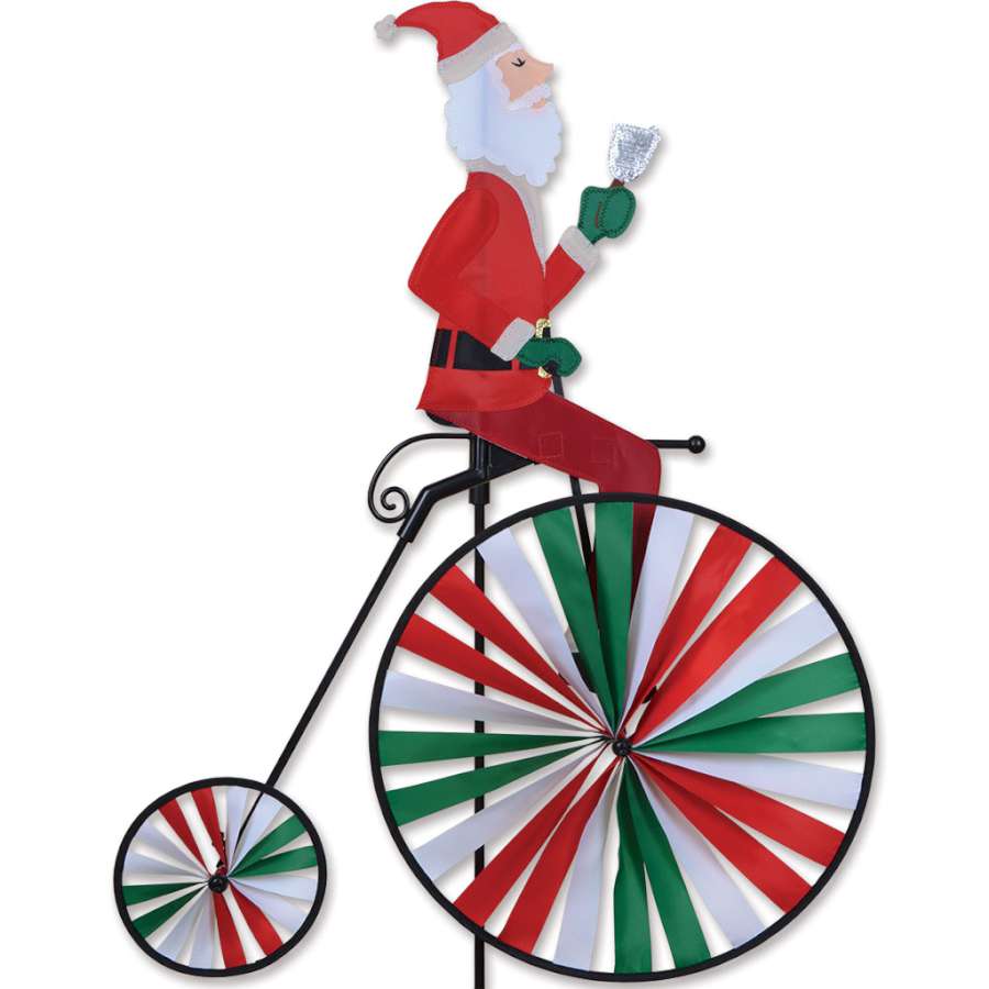High Wheel Bike Spinner featuring a colorful Santa design spinning in an outdoor setting, capturing festive spirit with its vibrant colors.