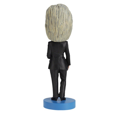 Hillary Clinton 2016 bobblehead, standing approximately 8 inches tall, capturing her likeness in vibrant detail, displayed on a shelf.