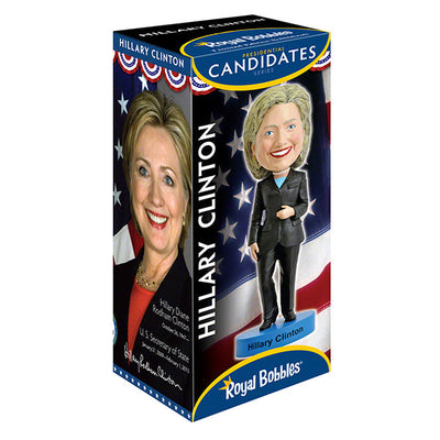 Hillary Clinton 2016 bobblehead, standing approximately 8 inches tall, capturing her likeness in vibrant detail, displayed on a shelf.