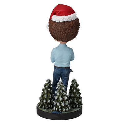 Holiday Bob Ross Bobblehead featuring Bob Ross in a winter sweater, approximately 8 inches tall, smiling joyfully.