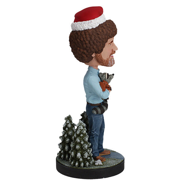 Holiday Bob Ross Bobblehead featuring Bob Ross in a winter sweater, approximately 8 inches tall, smiling joyfully.