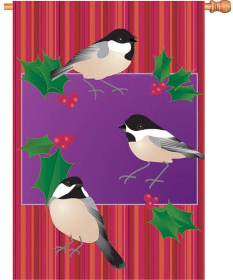 28-inch Holiday Chickadees flag featuring vibrant festive elements and cheerful birds displayed on a garden stand in an outdoor setting.