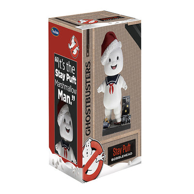 Holiday Ghostbusters Stay Puft Bobblehead with festive Santa hat, measuring 7 inches, showcased among Christmas decorations.