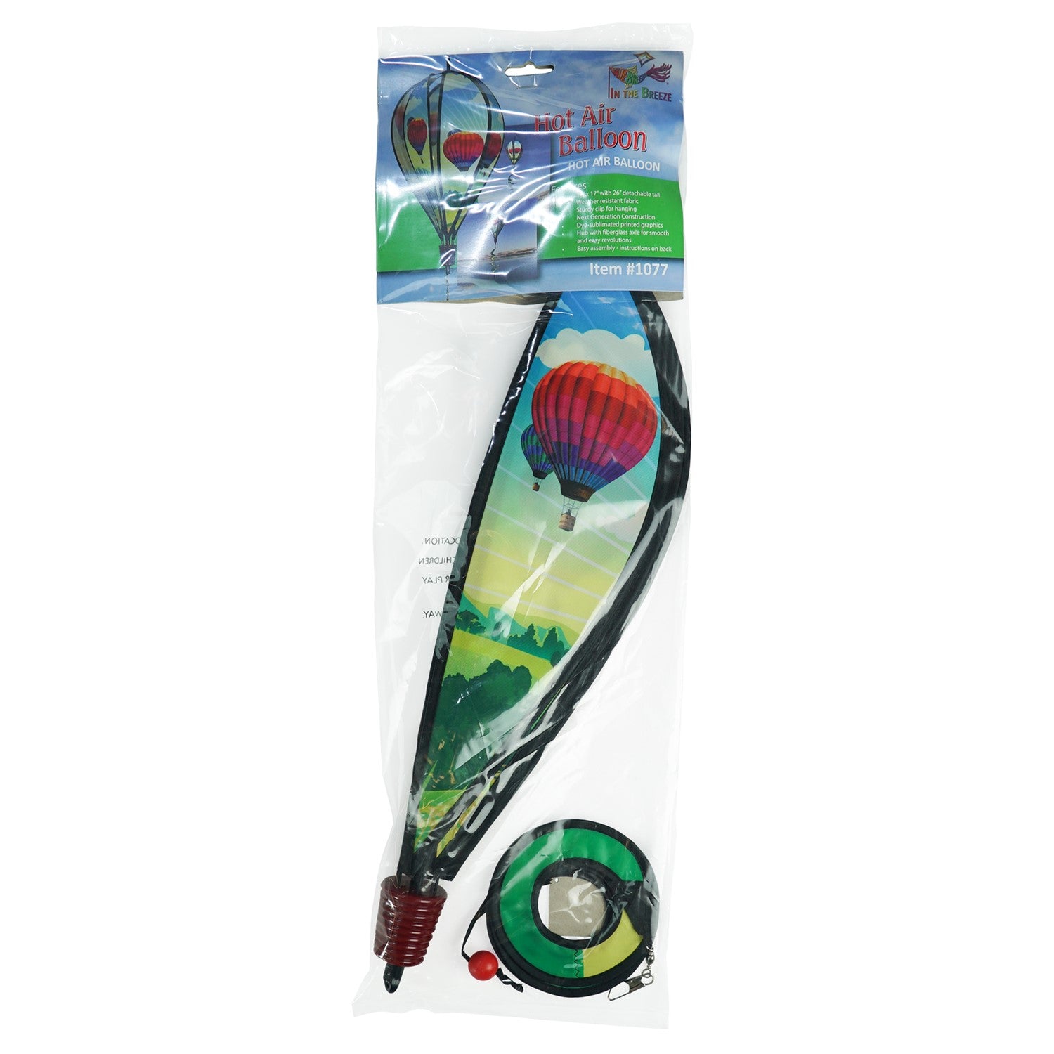 Colorful Hot Air Balloon spinner in vibrant fabric spinning in a garden setting, showcasing unique designs on each panel as it catches the wind.