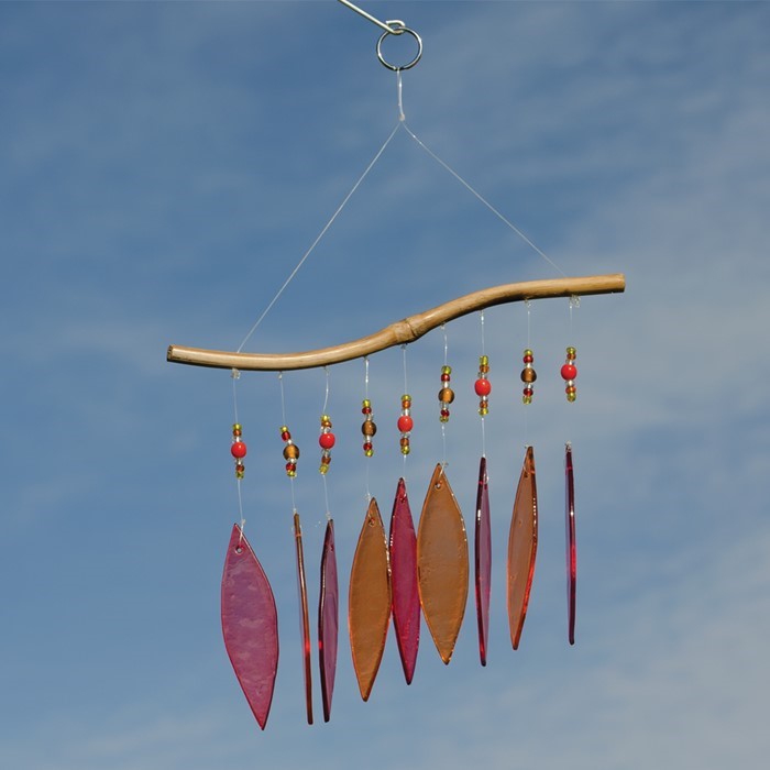 Hot Glass and Bead Wind Chime featuring colorful translucent glass and bamboo hanging bar, catching sunlight with vibrant reflections.