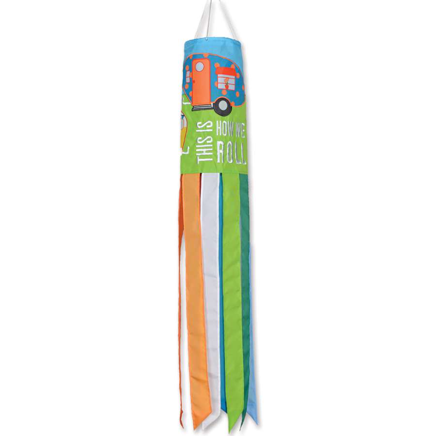Colorful How We Roll windsock displaying the phrase 'THIS IS HOW WE ROLL' swaying gracefully in the breeze outdoors.