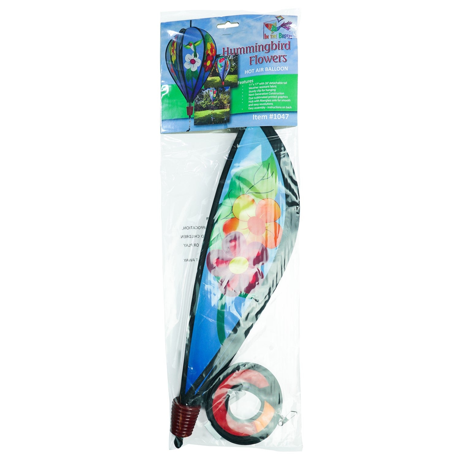Hummingbird Flowers Hot Air Balloon spinner with colorful flower and hummingbird designs, spinning gracefully in an outdoor setting.
