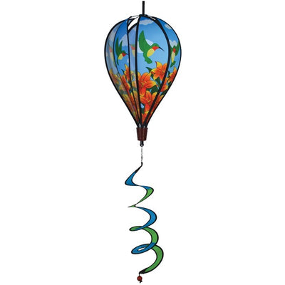 Hummingbird Lily Hot Air Balloon garden decor, showcasing vivid imagery of hummingbirds and lily flowers, spinning gently in the breeze.