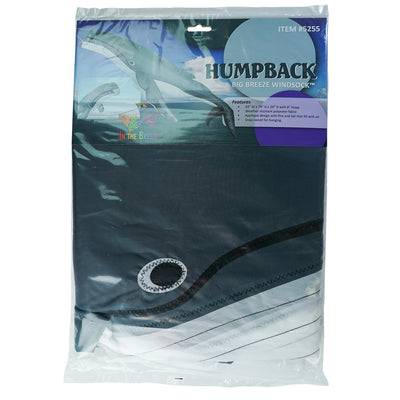 Humpback Big Breeze WindsockTM in a vibrant 3D design displayed in an outdoor garden, showcasing a whale in motion against the breeze.