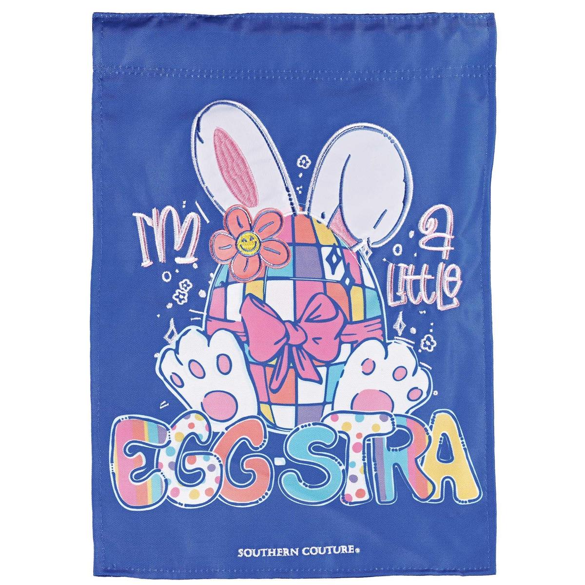I Am A Little Egg-Stra double-sided garden flag with playful egg design displayed outdoors, showcasing vibrant colors and detailed embroidery.