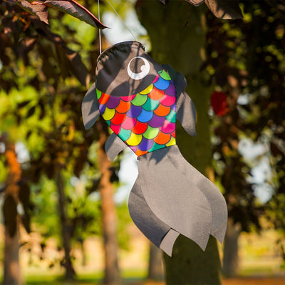 Alt Text: 15-inch Black & Rainbow Damsel Fish windsock fluttering gently in the breeze, showcasing vibrant colors and playful design.