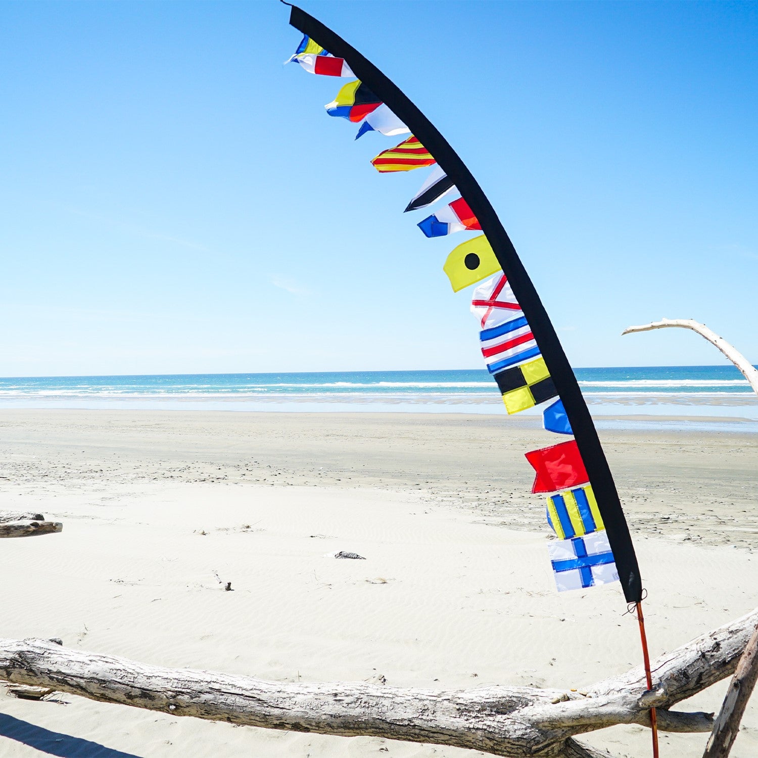 Alt Text: 8-foot Signal Flag Pennant Banner showcasing vibrant colored flags fluttering on a pole, ideal for events and businesses.