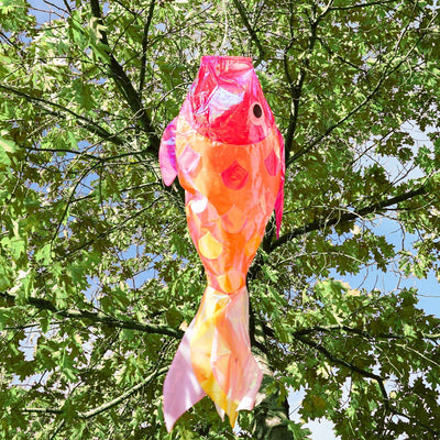 48 inch iridescent hot damsel fish windsock featuring colorful shimmering scales and an applique design hanging gracefully outdoors.