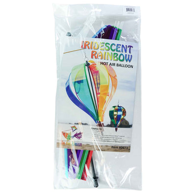 Iridescent Rainbow 6-Panel Hot Air Balloon spinner in vibrant colors, gently rotating in an outdoor garden setting.