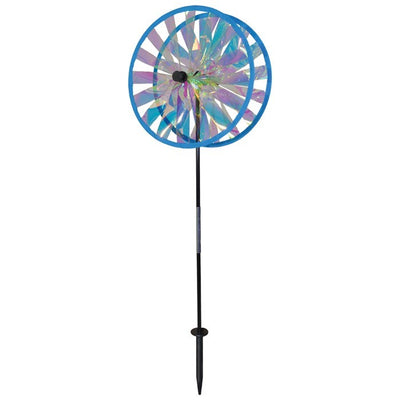 Iridescent Sparkle Duo Wheel Spinner with two colorful reflective wheels rotating in a vibrant outdoor garden setting.