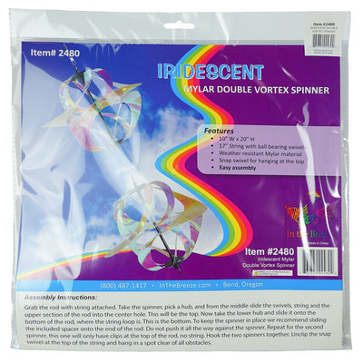Iridescent Vortex Double Spinner showcasing interconnected Mylar spirals spinning in a sunny garden setting, creating a vibrant visual display.