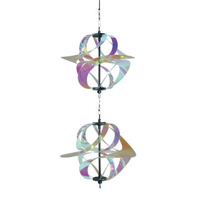 Iridescent Vortex Double Spinner showcasing interconnected Mylar spirals spinning in a sunny garden setting, creating a vibrant visual display.