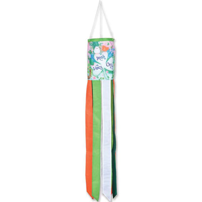 Irish Vibes Windsock featuring bright colors and the phrase 'Irish Vibes Only' flying in the breeze in an outdoor garden setting.