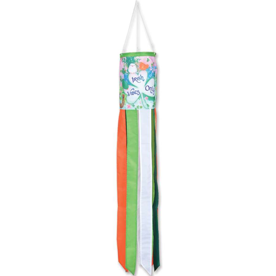 Irish Vibes Windsock featuring bright colors and the phrase 'Irish Vibes Only' flying in the breeze in an outdoor garden setting.