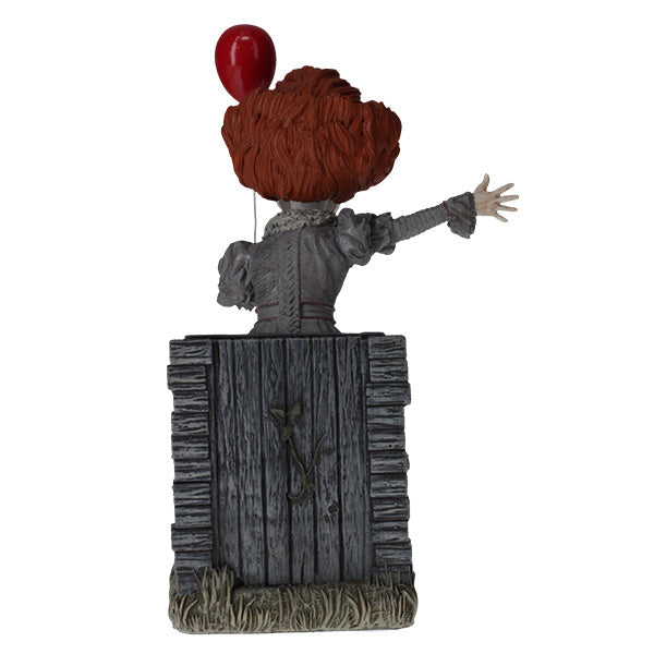 IT: Pennywise Bobblehead made from heavyweight hand-painted polyresin, depicting a menacing Pennywise from IT CHAPTER TWO in a detailed design.
