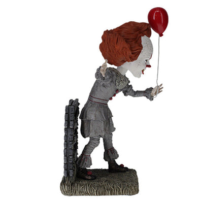 IT: Pennywise Bobblehead made from heavyweight hand-painted polyresin, depicting a menacing Pennywise from IT CHAPTER TWO in a detailed design.