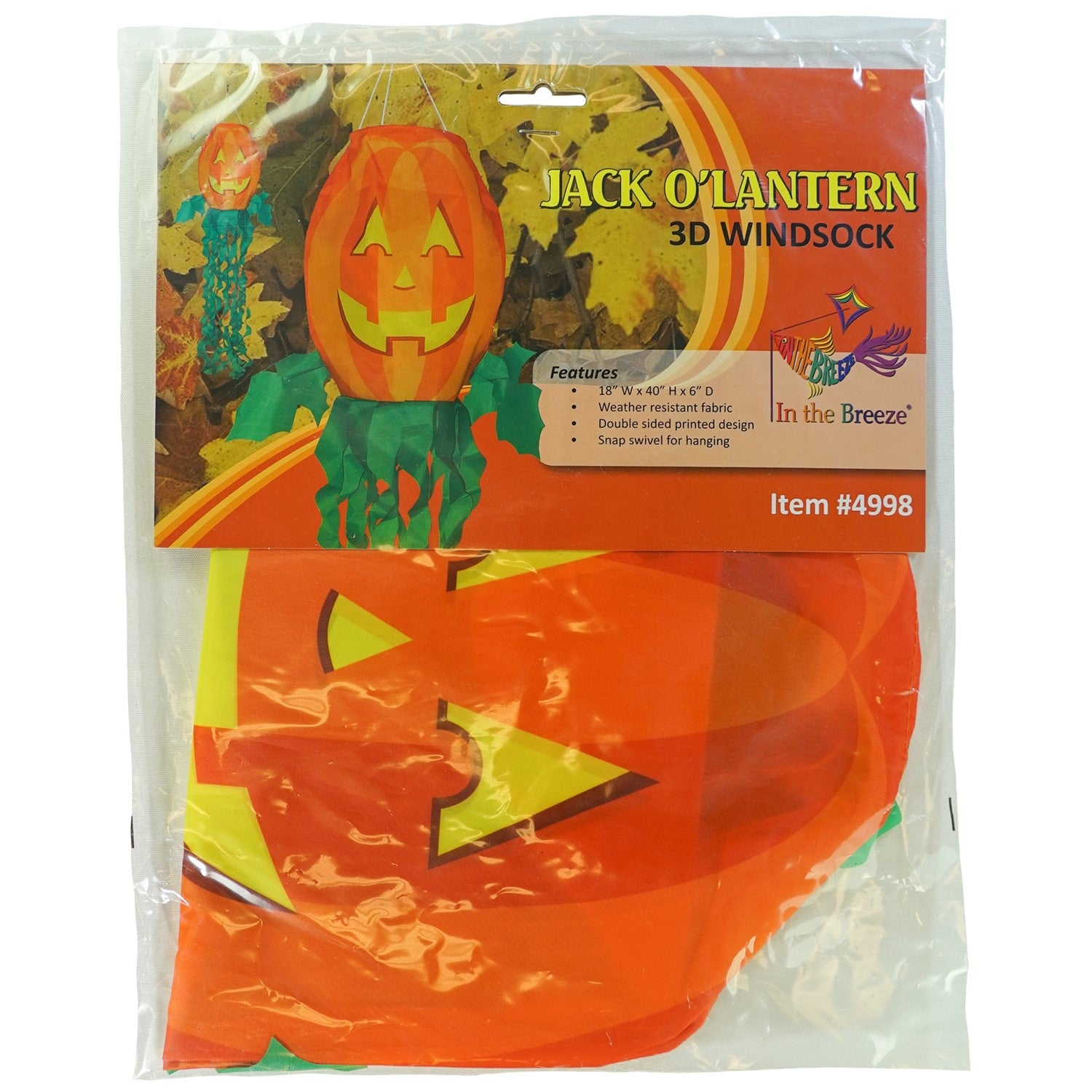 Jack O' Lantern 3D windsock featuring a vibrant pumpkin design and curlie streamer tails, displayed outdoors, fluttering in the breeze.