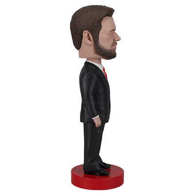 JD Vance Bobblehead standing 8 inches tall, meticulously detailed with a lively spring-mounted head, perfect for display in any collection.