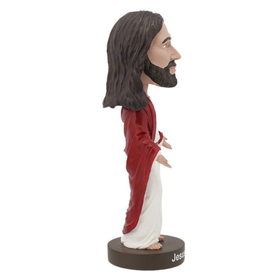 Hand-painted Jesus Christ Bobblehead made of heavyweight polyresin, showcasing intricate details, displayed indoors on a shelf.