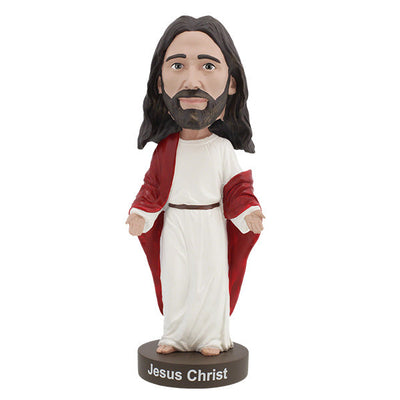 Hand-painted Jesus Christ Bobblehead made of heavyweight polyresin, showcasing intricate details, displayed indoors on a shelf.