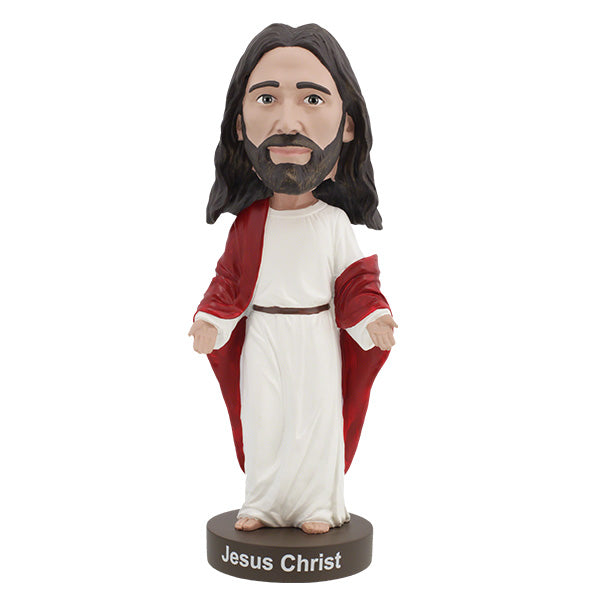Hand-painted Jesus Christ Bobblehead made of heavyweight polyresin, showcasing intricate details, displayed indoors on a shelf.