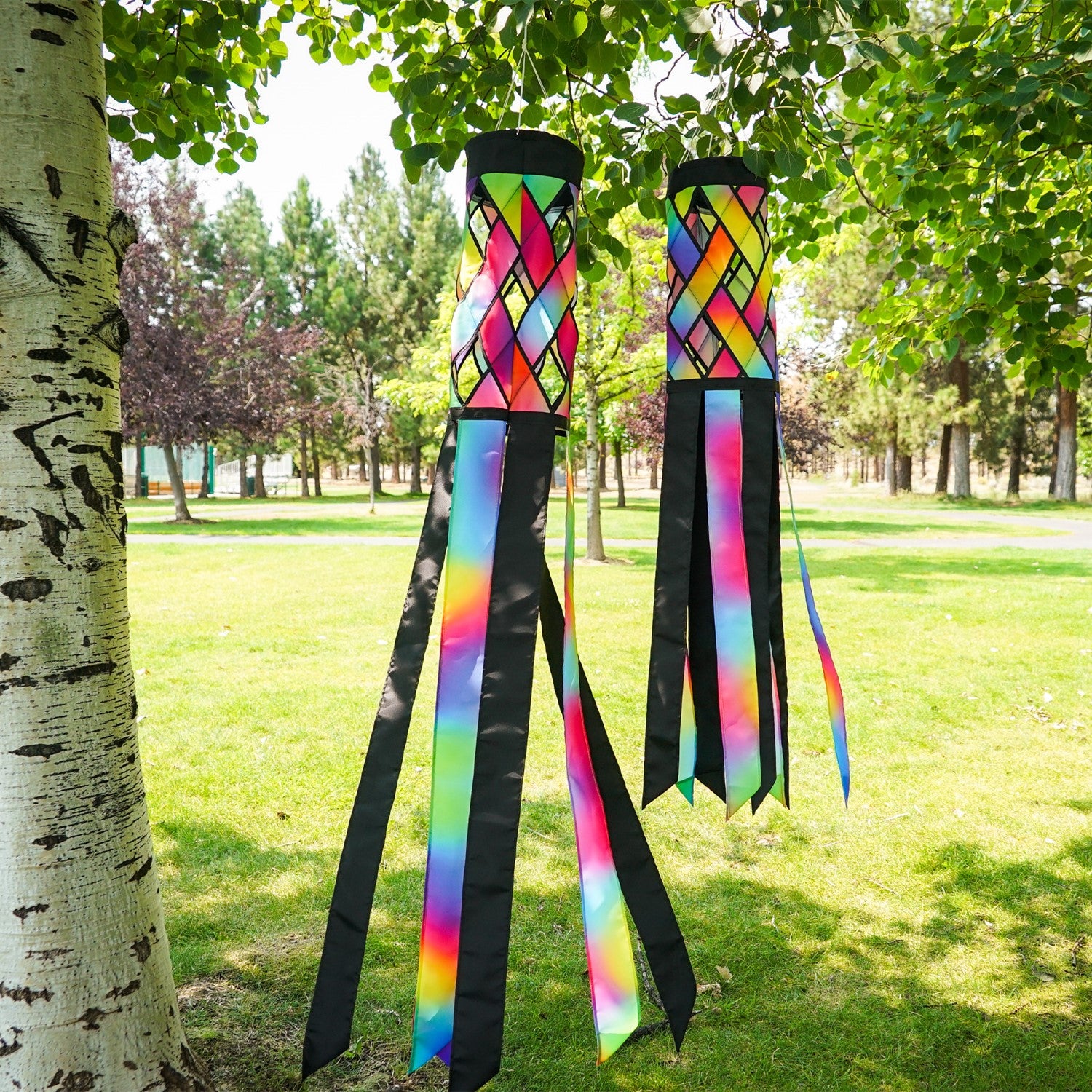 Brightly colored Jewel Diagonal Weave 60" Windsock showcasing jewel tones and black tails fluttering in the breeze, perfect for outdoor decor.