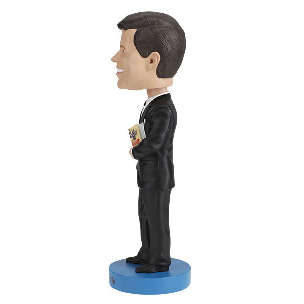 John F. Kennedy v3 bobblehead standing 7 inches tall, depicted holding his book 'Profiles in Courage', intricately hand-painted for collectors.