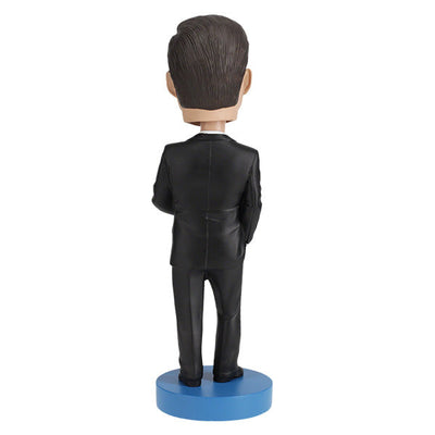John F. Kennedy v3 bobblehead standing 7 inches tall, depicted holding his book 'Profiles in Courage', intricately hand-painted for collectors.