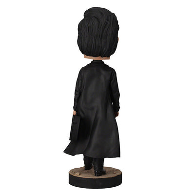 Johnny Cash Bobblehead featuring the iconic Man in Black in detailed finish, measuring 8 inches, perfect for collectors and fans of country music.