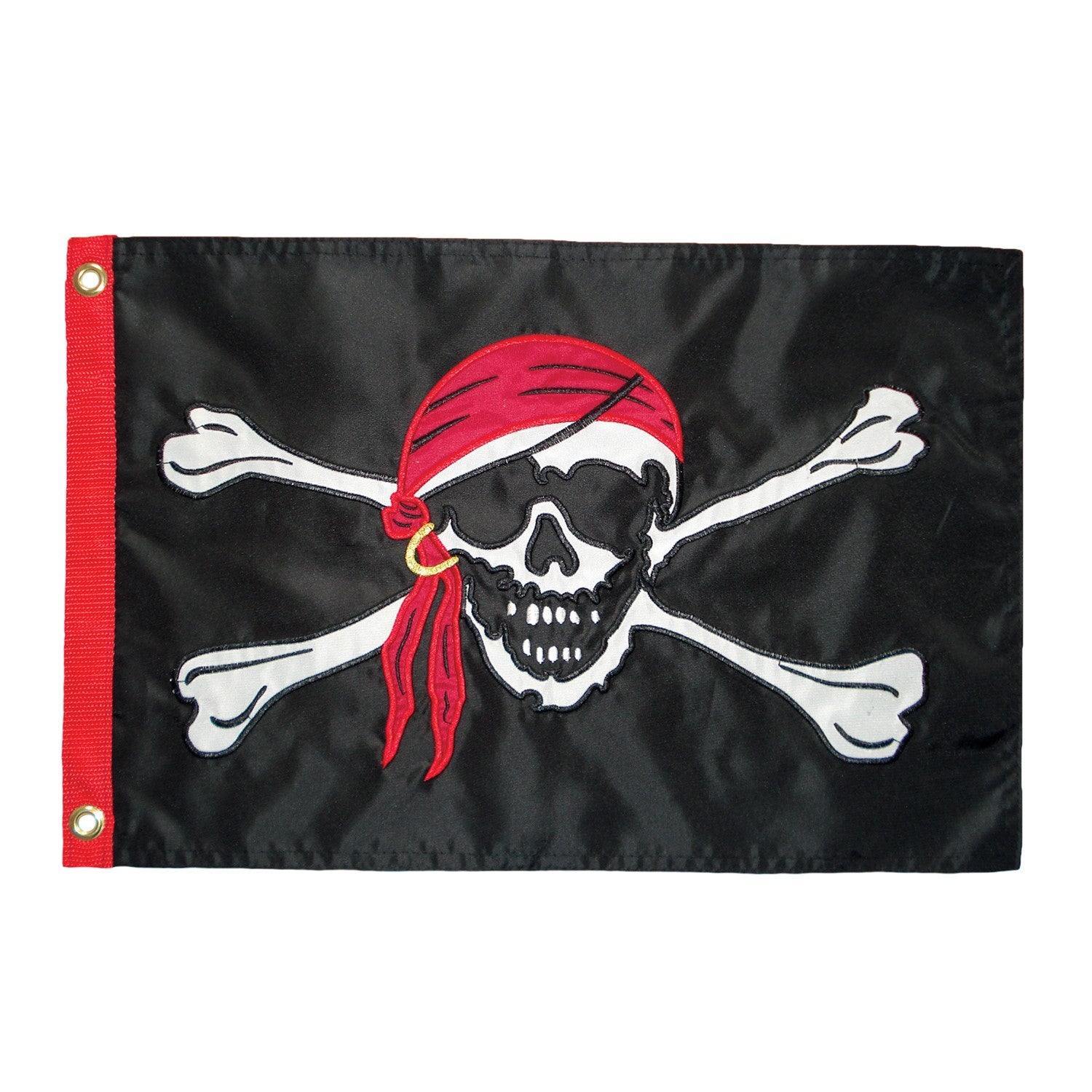 Jolly Roger Applique 12x18 Grommet Flag featuring a bold skull and crossbones design, displayed outdoors on a flagpole against a clear sky.