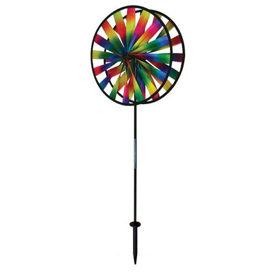 Kaleidoscope Double Wheel Spinner featuring rainbow colors and durable fiberglass frames, spinning in a garden setting on a sunny day.