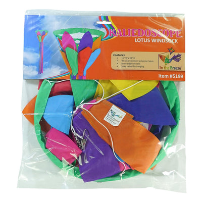 Kaleidoscope 38-inch Lotus Flower Windsock featuring bright petals and flowing rainbow tails, displayed outdoors in a garden setting.