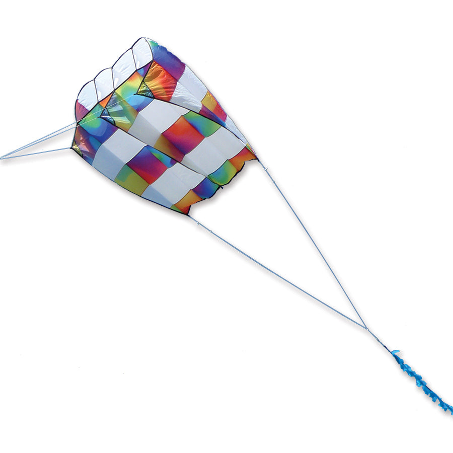 Killip Foil Kite 10 in rainbow stripes soaring against a bright blue sky, displaying its 44x47.5 inch form and 36 foot fuzzy tail.