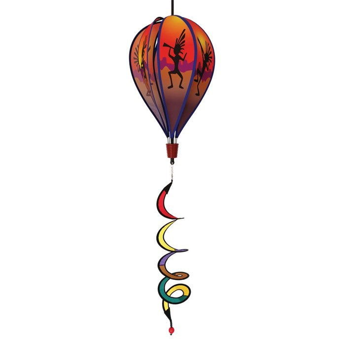 Visualize a colorful Kokopelli Hot Air Balloon spinner measuring 26 inches, elegantly spinning in the breeze, showcasing vibrant Southwest-themed designs against a clear sky.