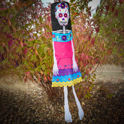 La Catrina 40-inch Breeze Buddy colorful windsock featuring sugar skull design with free-flowing arms and legs, perfect for outdoor Halloween decor.