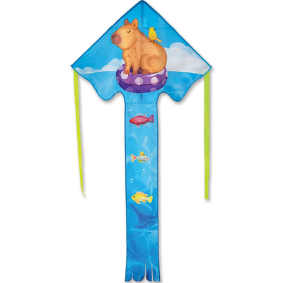 Large Easy Flyer Kite - Capybara measuring 46x90 inches soaring in the sky on a sunny day, showcasing its vibrant design and effortless flying ability.